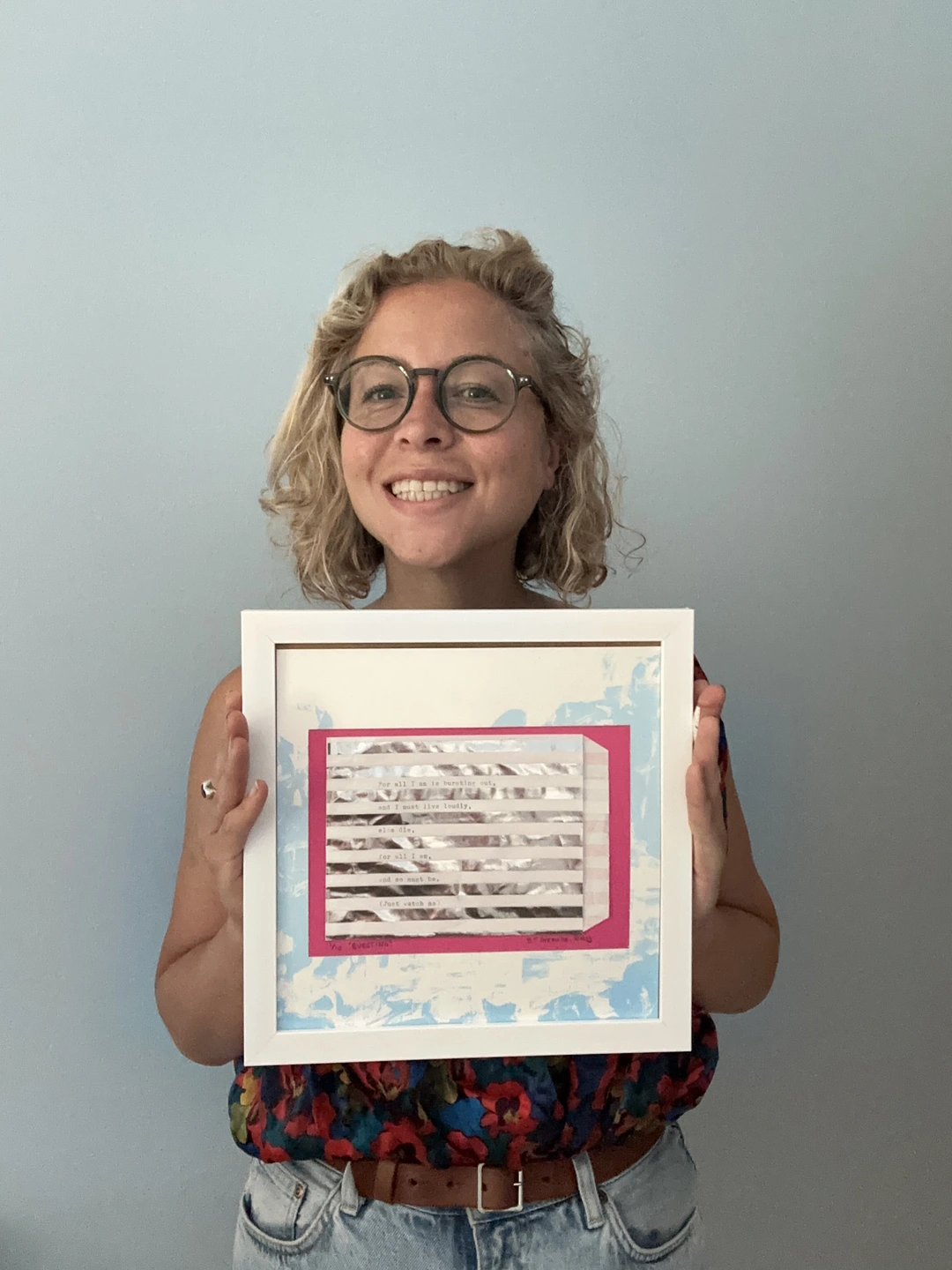 Emily Holding a Framed Sweet Nothing Smiling