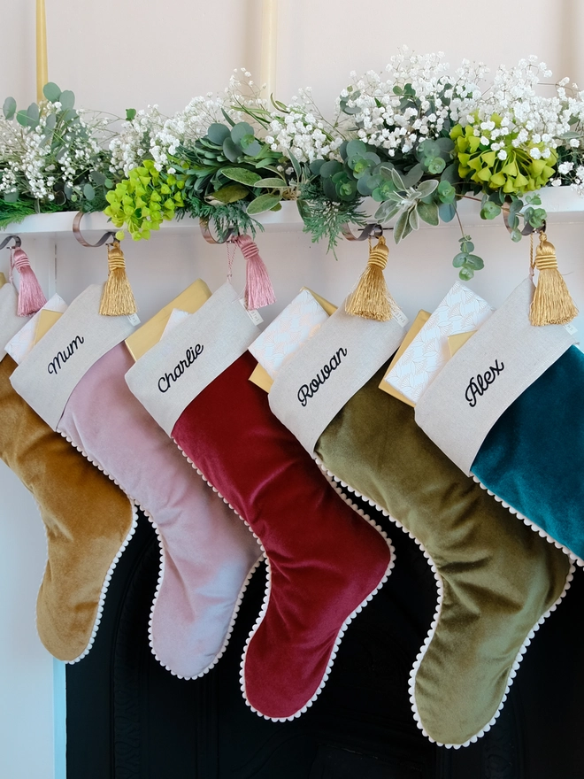 velvet stockings for all the family hung from the mantle piece