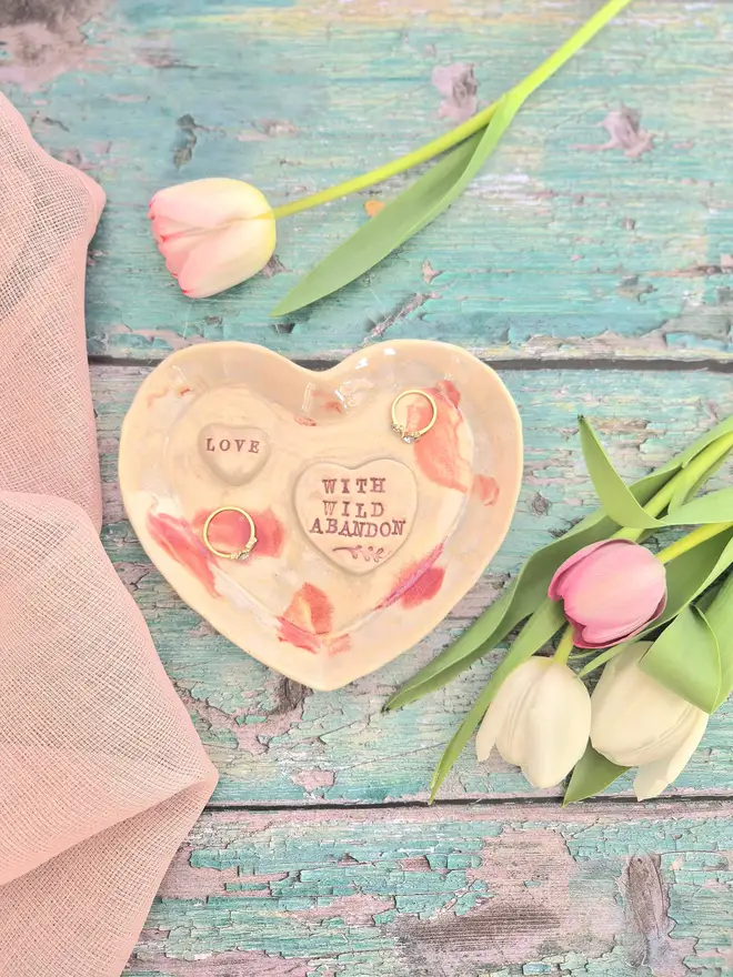 heart ceramic dish with love with wild abandon, pottery dish, jewellery dish, Jenny Hopps Pottery, heart ceramic dish, heart pottery dish, gift for loved one, gift for girlfriend, gift for wife, gift for fiancee, romantic gift, handcrafted ceramics, ceramic heart plate, heart jewellery dish, heart trinket dish, pink