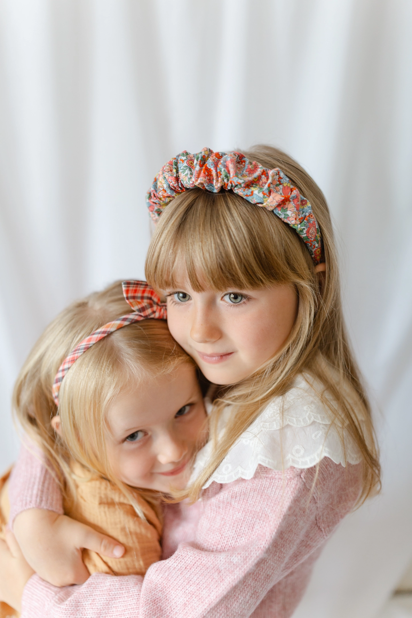 two little girls in their hairbands