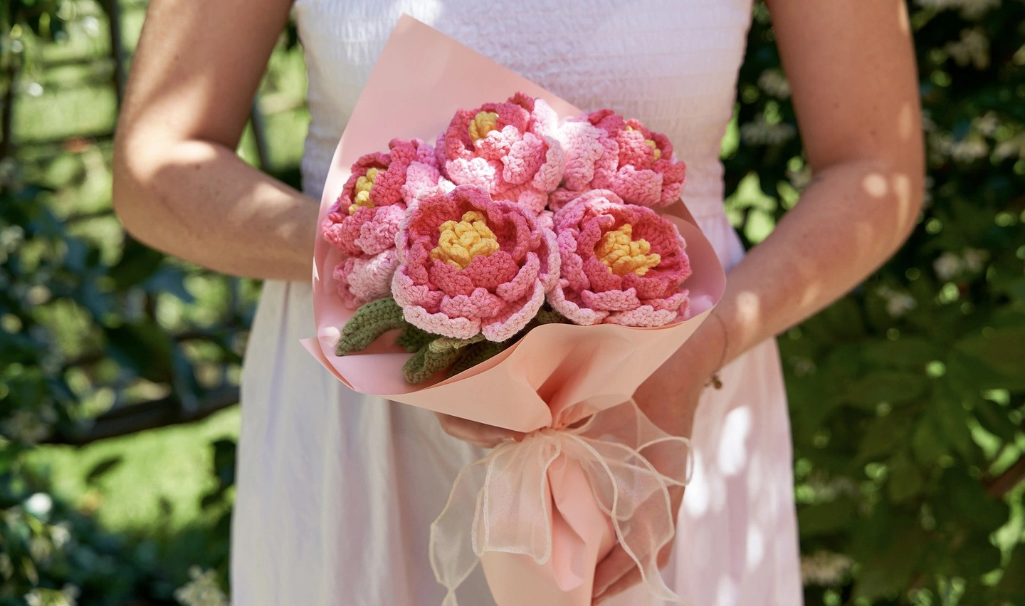Crochet peony flowers in a bouquet 