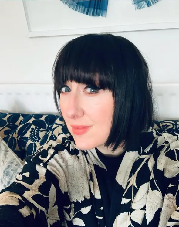 jolene taking a selfie, staring into the camera