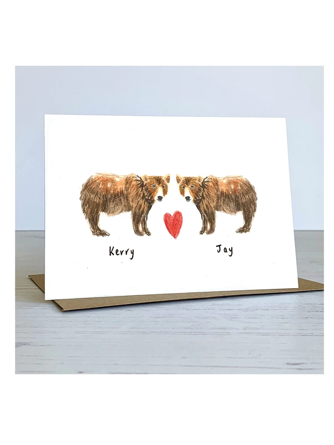 Hand finished and personalised Bear Greeting card.  hand finished with a painted love heart and hand written names 
