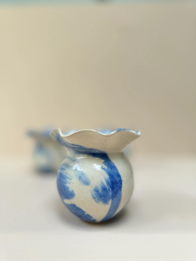 hand painted blue and white ceramic bud vase