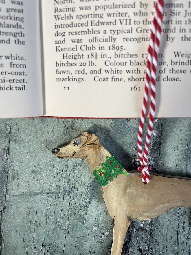 Whippet Christmas decoration with festive collar