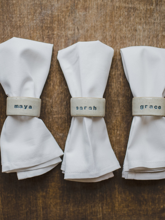 personalised napkin rings on white napkins