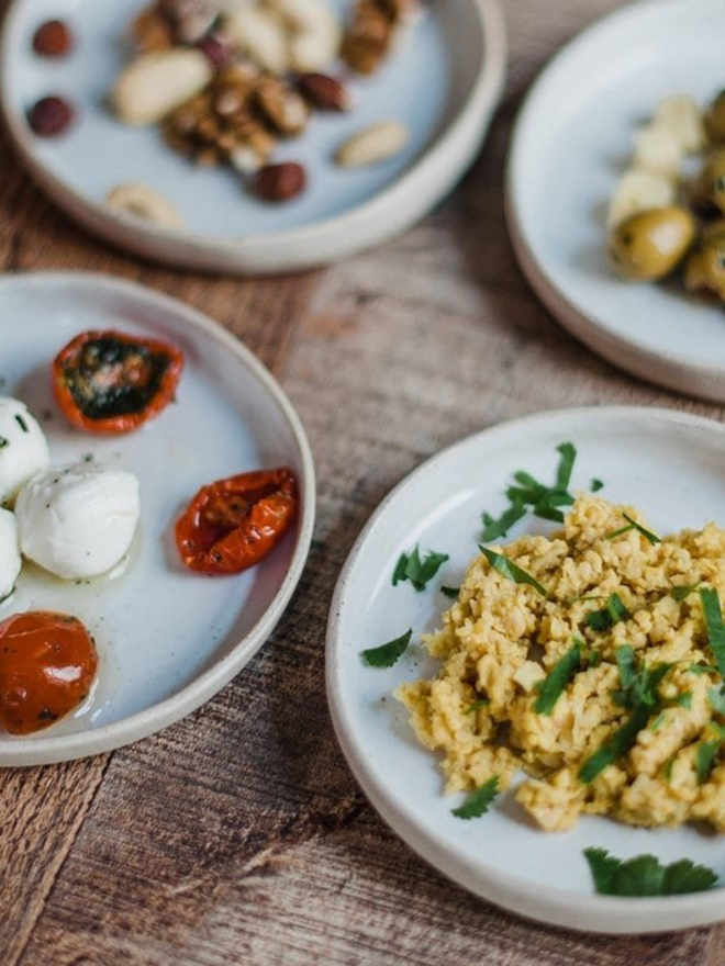 handmade white tapas dishes with tapas