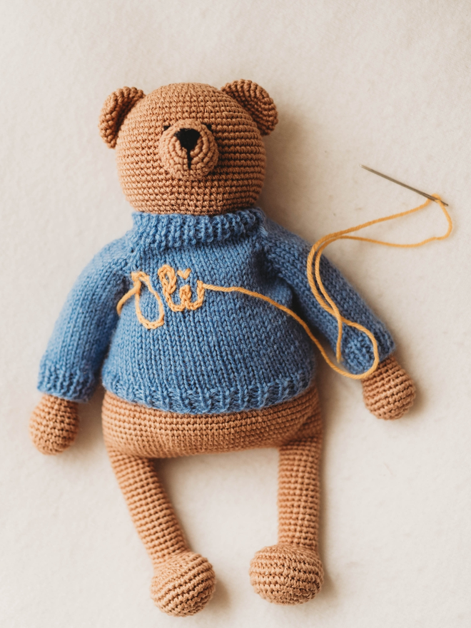 hand crochet brown teddy bear with blue hand knit jumper