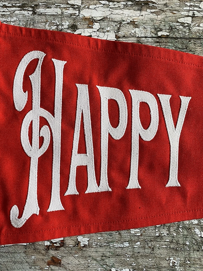Detail of a Happy Christmas pennant flag