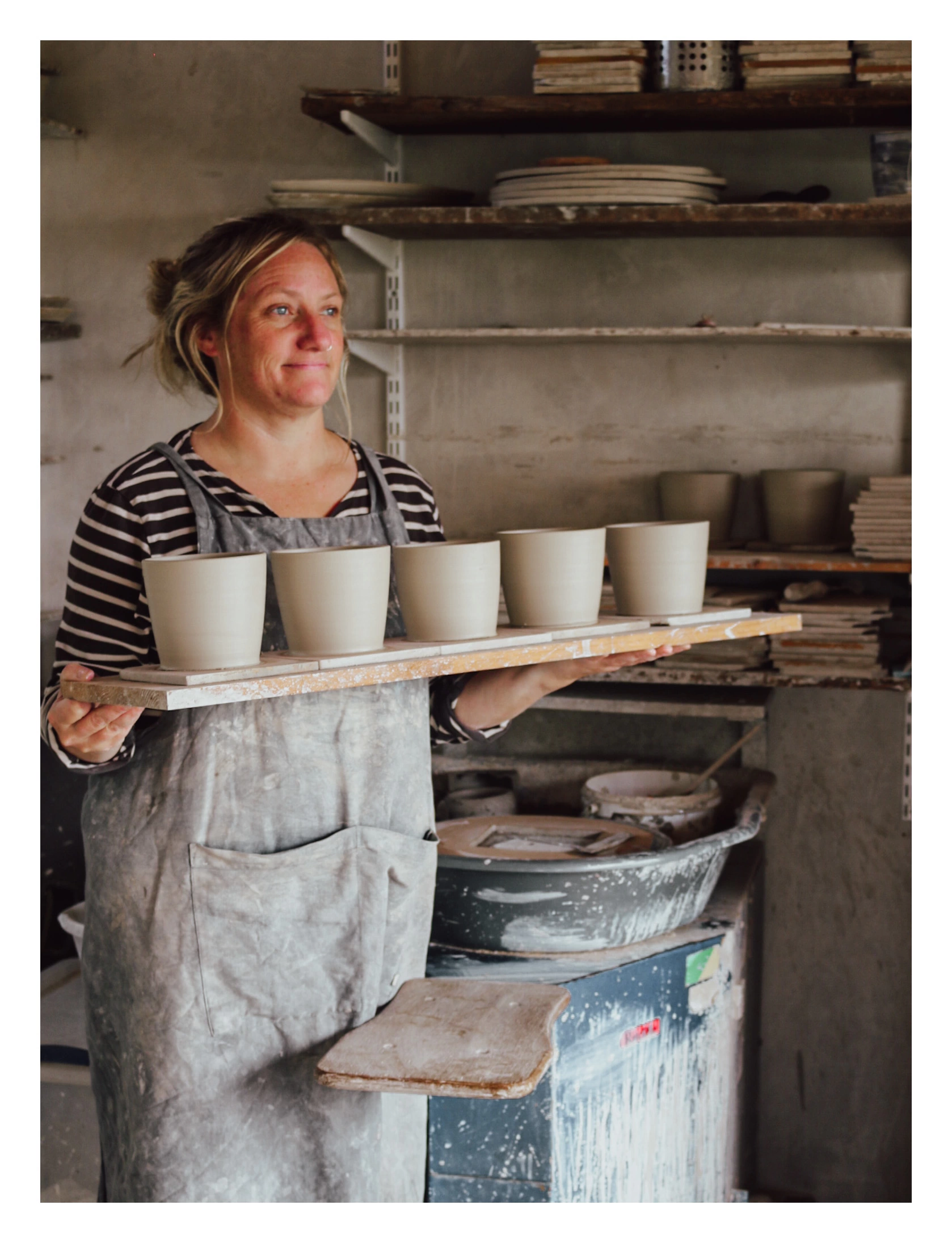 Laura Lane Ceramics at the pottery wheel storefront image