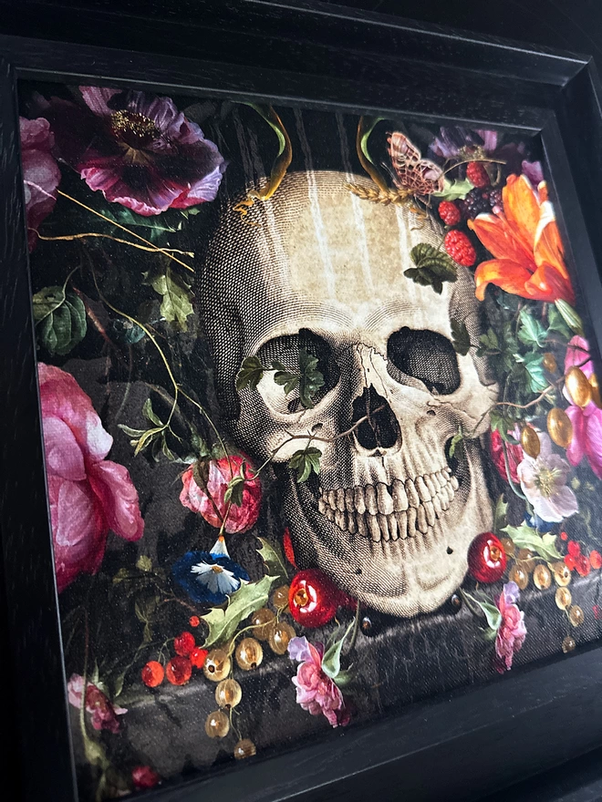 Memento mori skull and floral art print in black frame