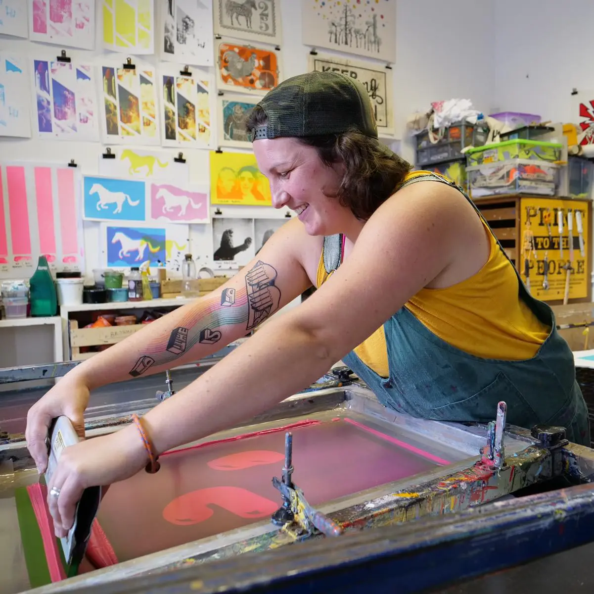 Picture of Jo Stafford screen printing in her studio