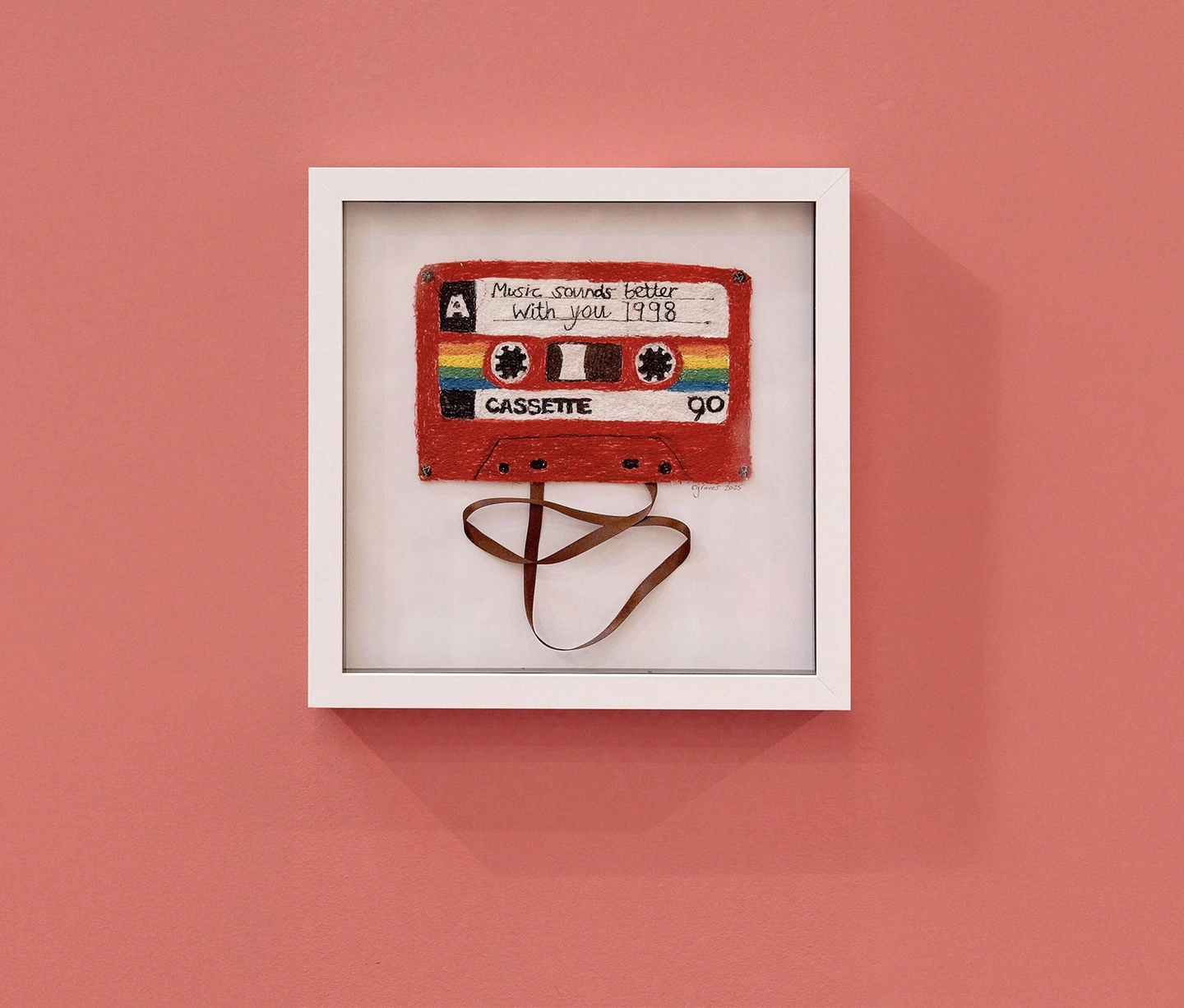 Embroidered cassette tape