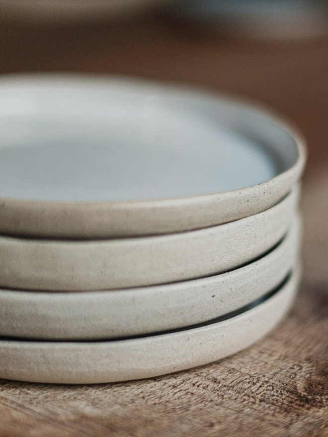 white ceramic dinner plate stack