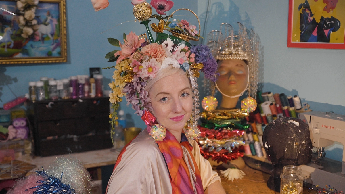 Jodie Cartman sitting wearing decorative headpiece 