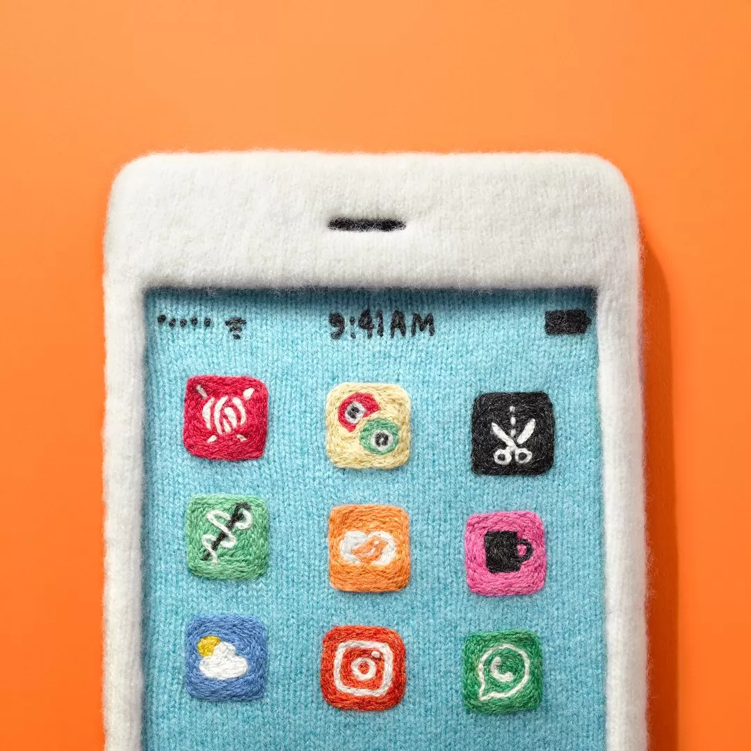 Knitted iPhone with icons on screen 