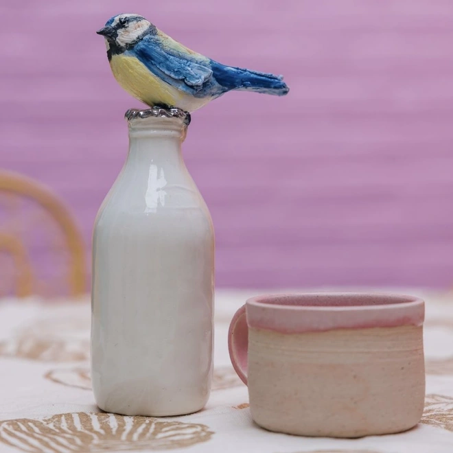 Jon williams ceramic milk bottle sculpture