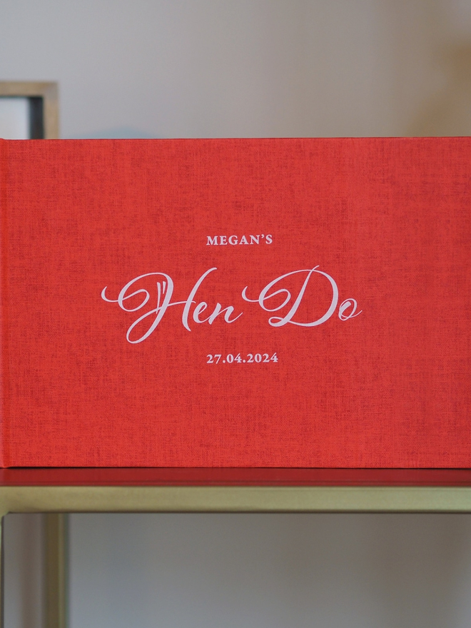 red personalised hen do guestbook