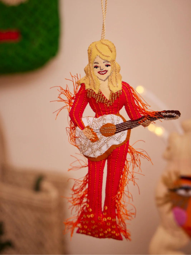 hand stitched Dolly Parton in red outfit with guitar hanging decoration