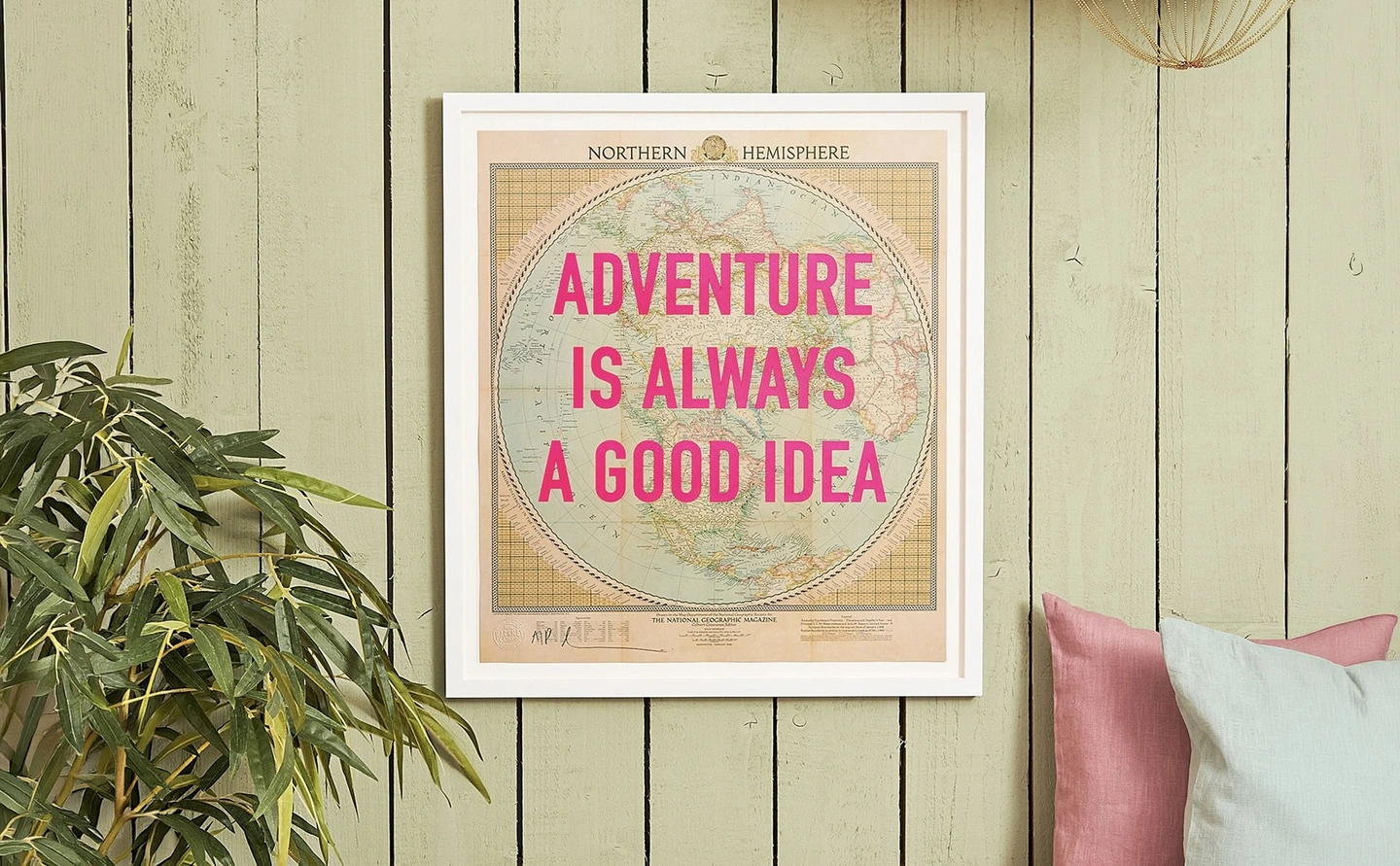 Adventure is always a good idea screenprint by Dave Buonaguidi. An original map with the words 'adventure is always a good idea' in neon pink