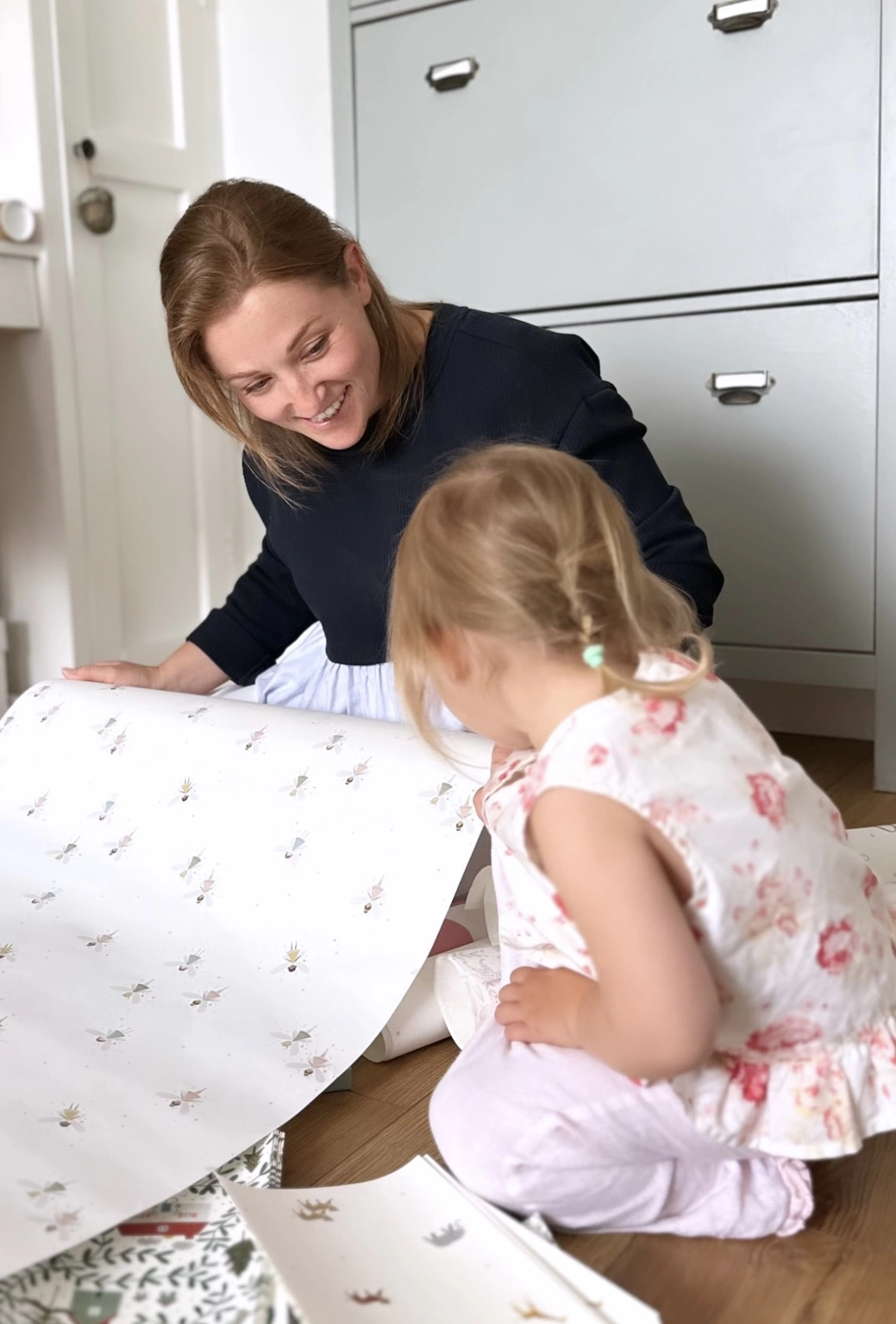 Lollie Dunbar with her daughter at their home