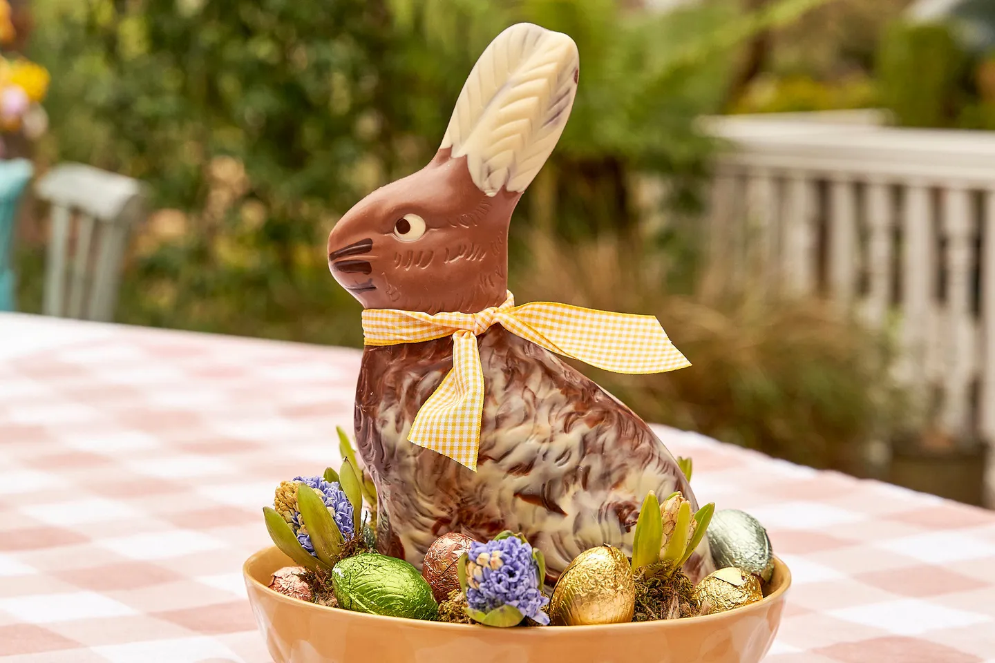 Giant chocolate easter hare on an easter table