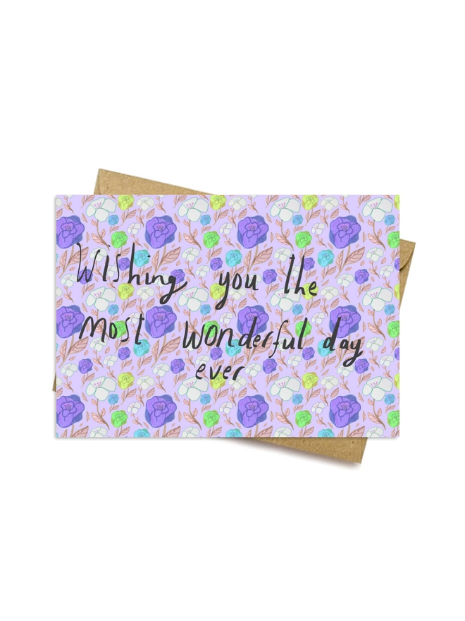 Purple floral background, reads 'Wishing you the most wonderful day ever'