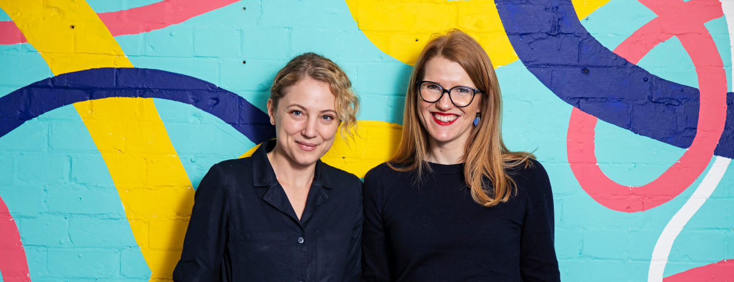 Helen Tupper and Sarah Ellis; founders of Amazing If, smiling at the camera.