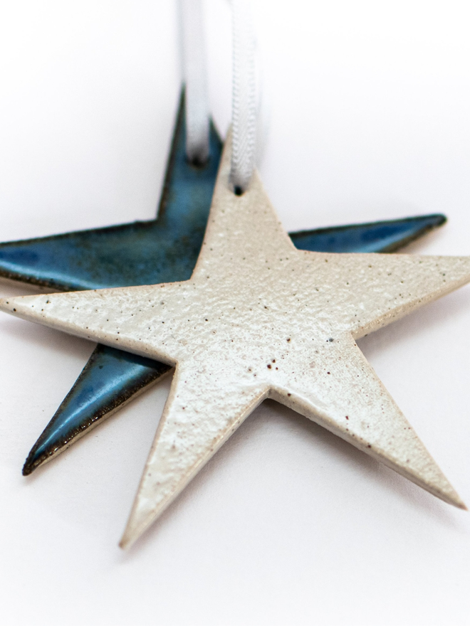 dark blue and white hanging star decorations