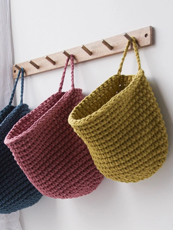 hand crocheted hanging storage baskets