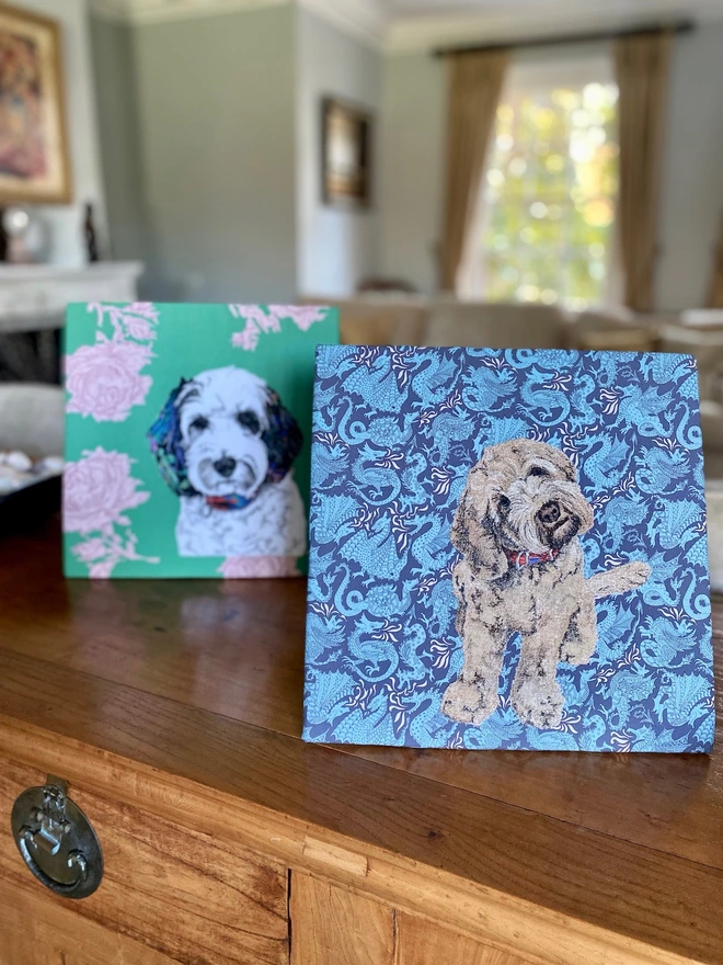 two embroidered pet portraits with their vibrant Liberty print backgrounds