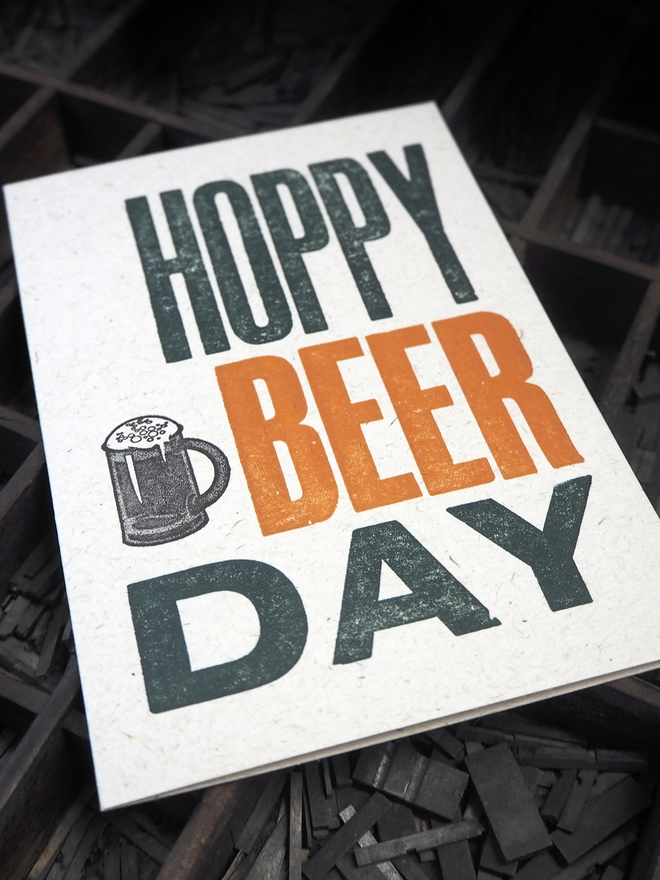 Hoppy Beer Day - Letterpress Birthday Card. Hand made letterpress birthday card, printed in orange and green on 100% recycled card using original wooden poster type.