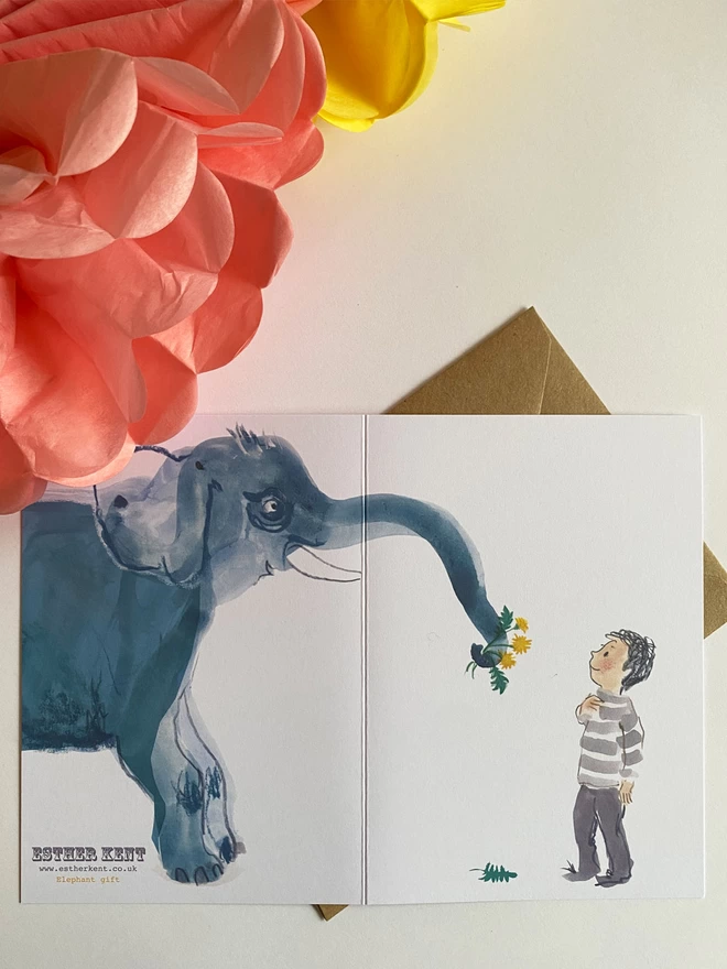 White illustrated card by Esther Kent, shows a small person in a striped top receiving a guft of flowers held in an elephant's trunk.