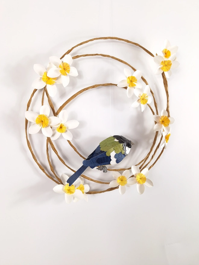 side view of a spring wreath with a great tit bird sculpture