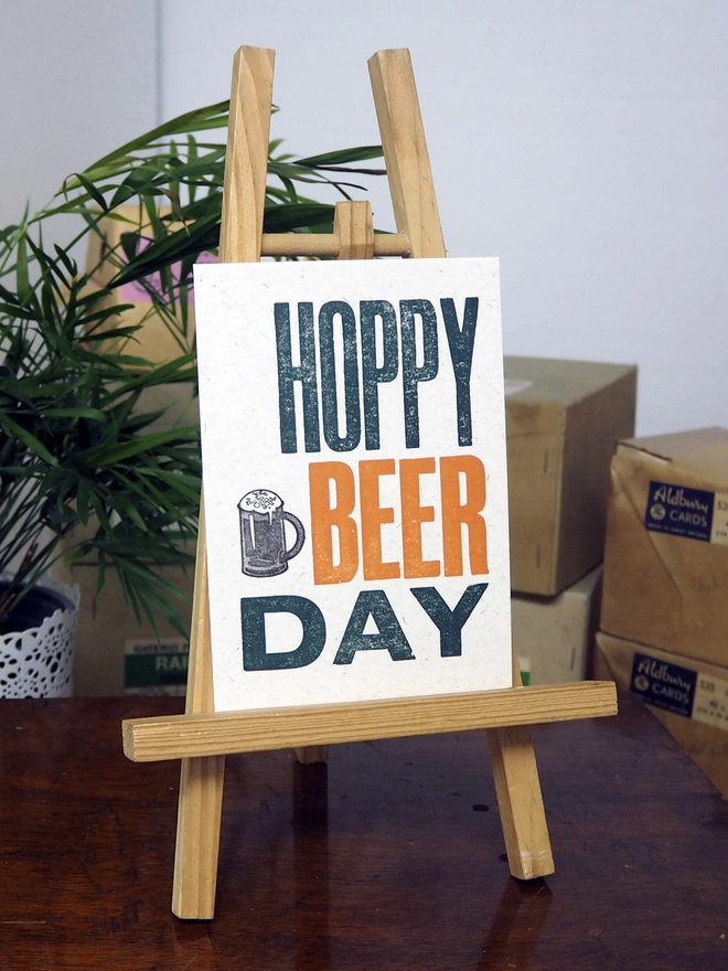 Hoppy Beer Day - Letterpress Birthday Card. Hand made letterpress birthday card, printed in orange and green on 100% recycled card using original wooden poster type.