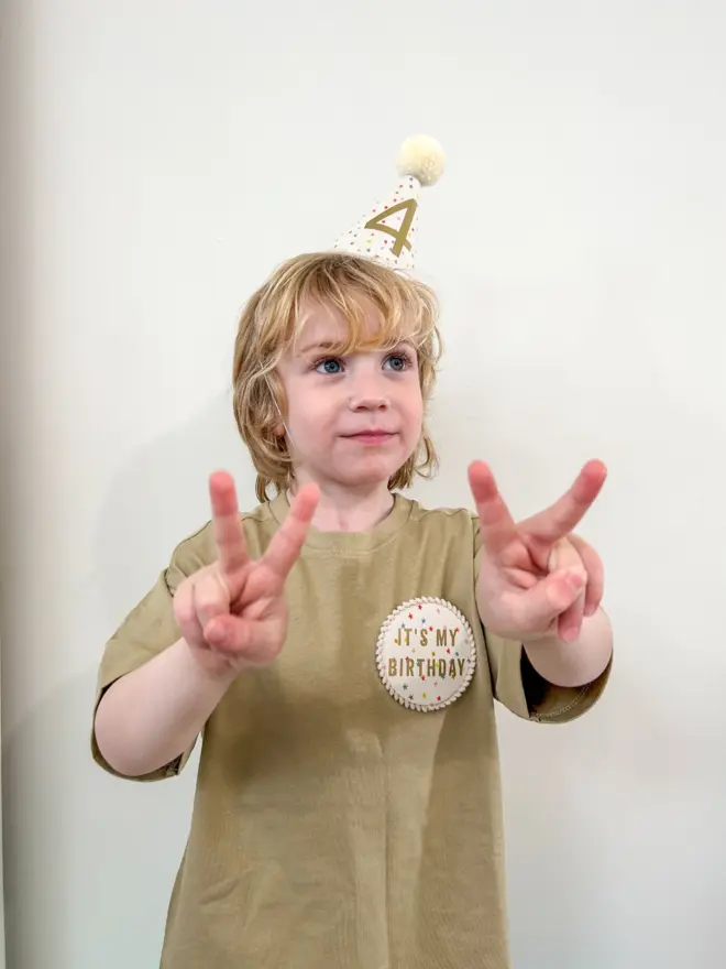 kids party hat with multi coloured stars