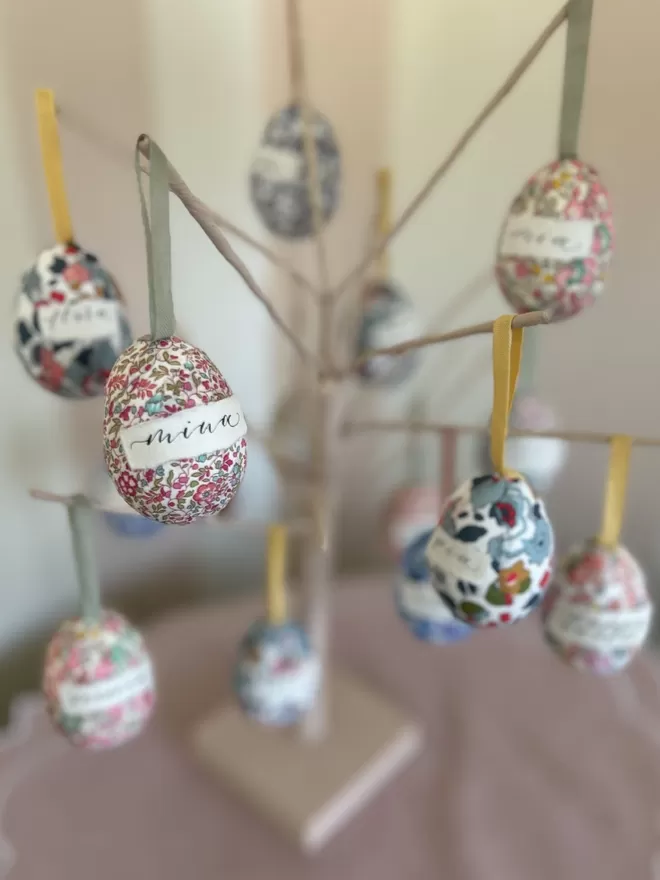 Personalised Liberty fabric decorative eggs hanging on Easter tree