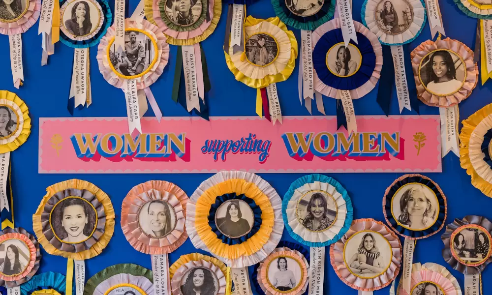 'women supporting women' wall