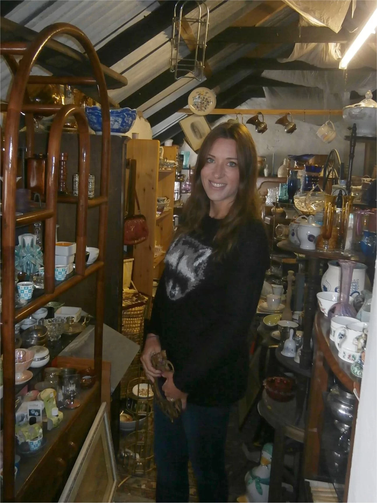 The Lucky Fox store owner Emma Mount thrifting in a junk shop for preloved vintage plates
