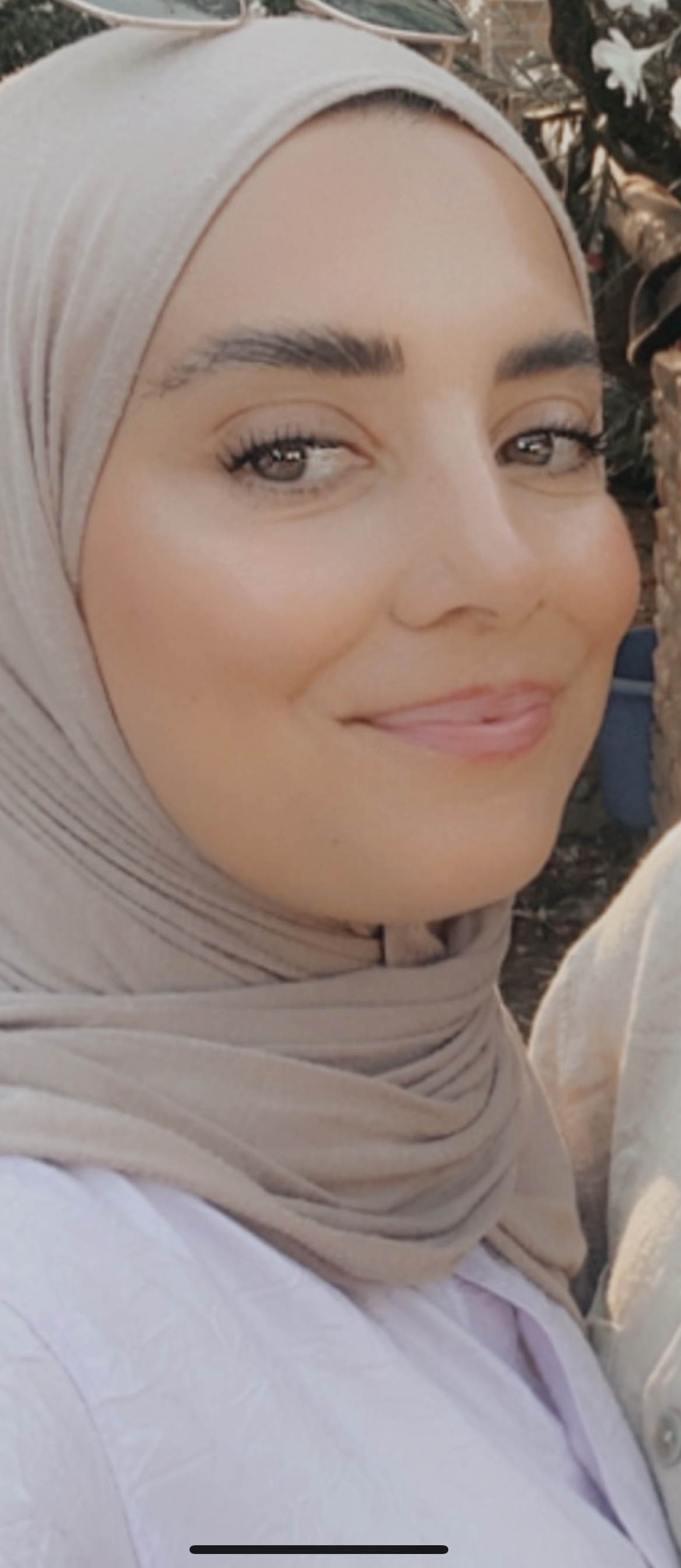 A picture of a lady wearing a hijab