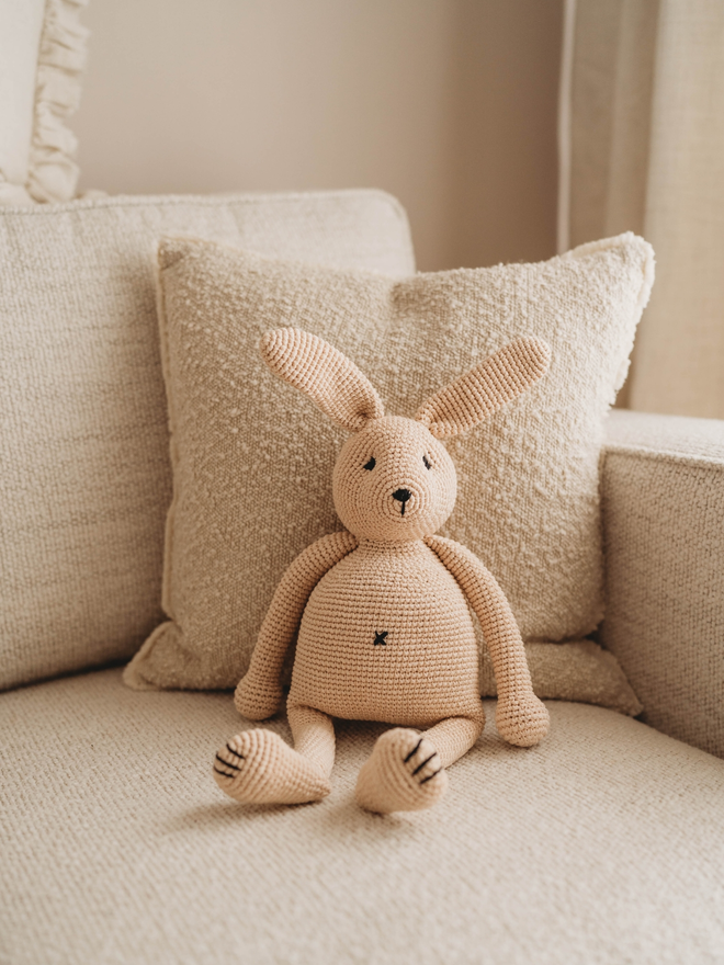 handmade crochet bunny rabbit on sofa