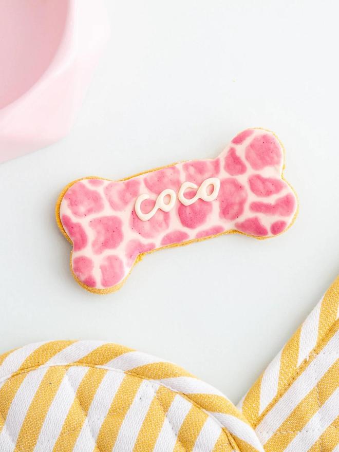 pink personalised iced dog bone biscuit