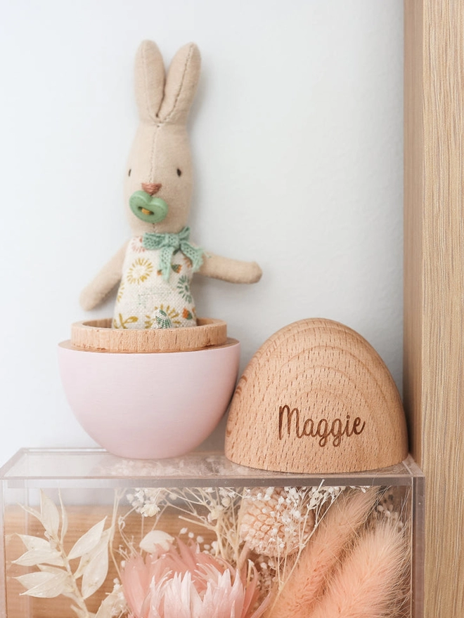 Wooden Hollow Egg engraved with the name Maggie in blush