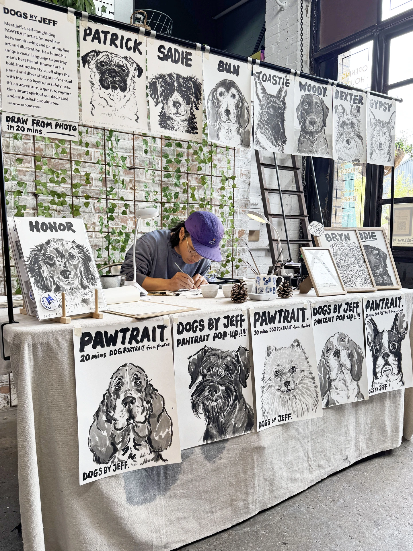 Jeff painting dogs at his pop up dog portrait booth