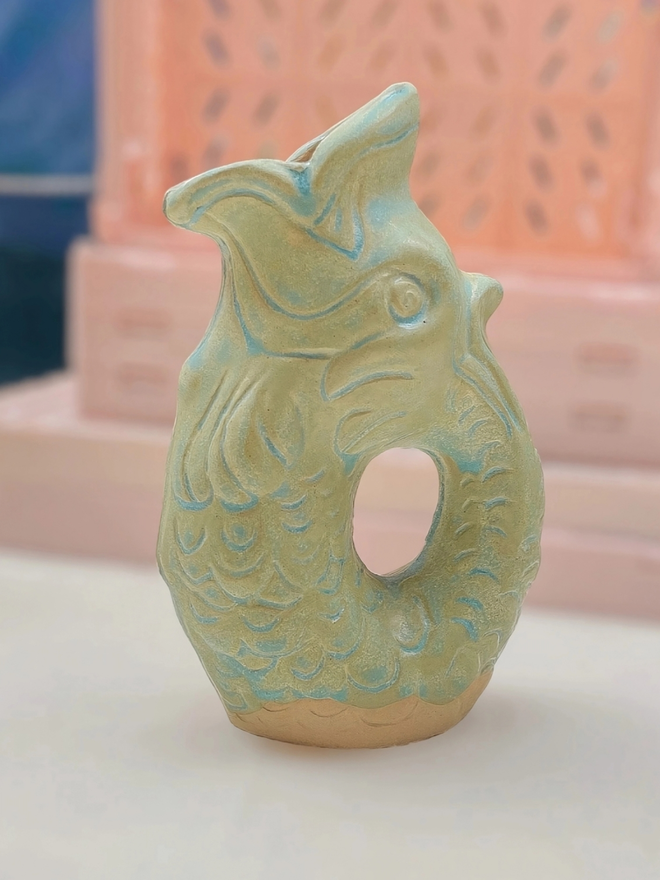 green ceramic fish jug