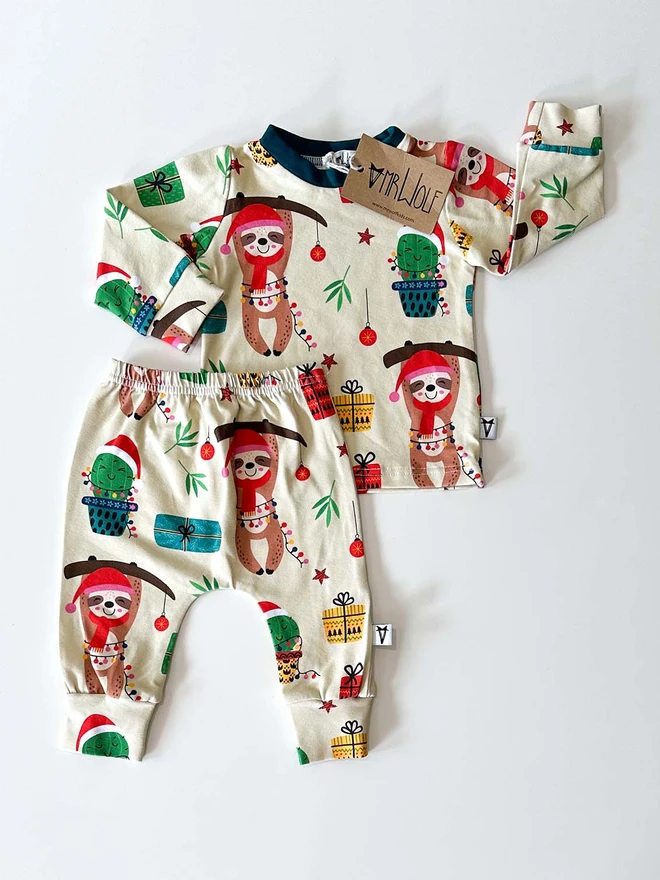 Baby and toddler lounge set with a cute festive sloth print