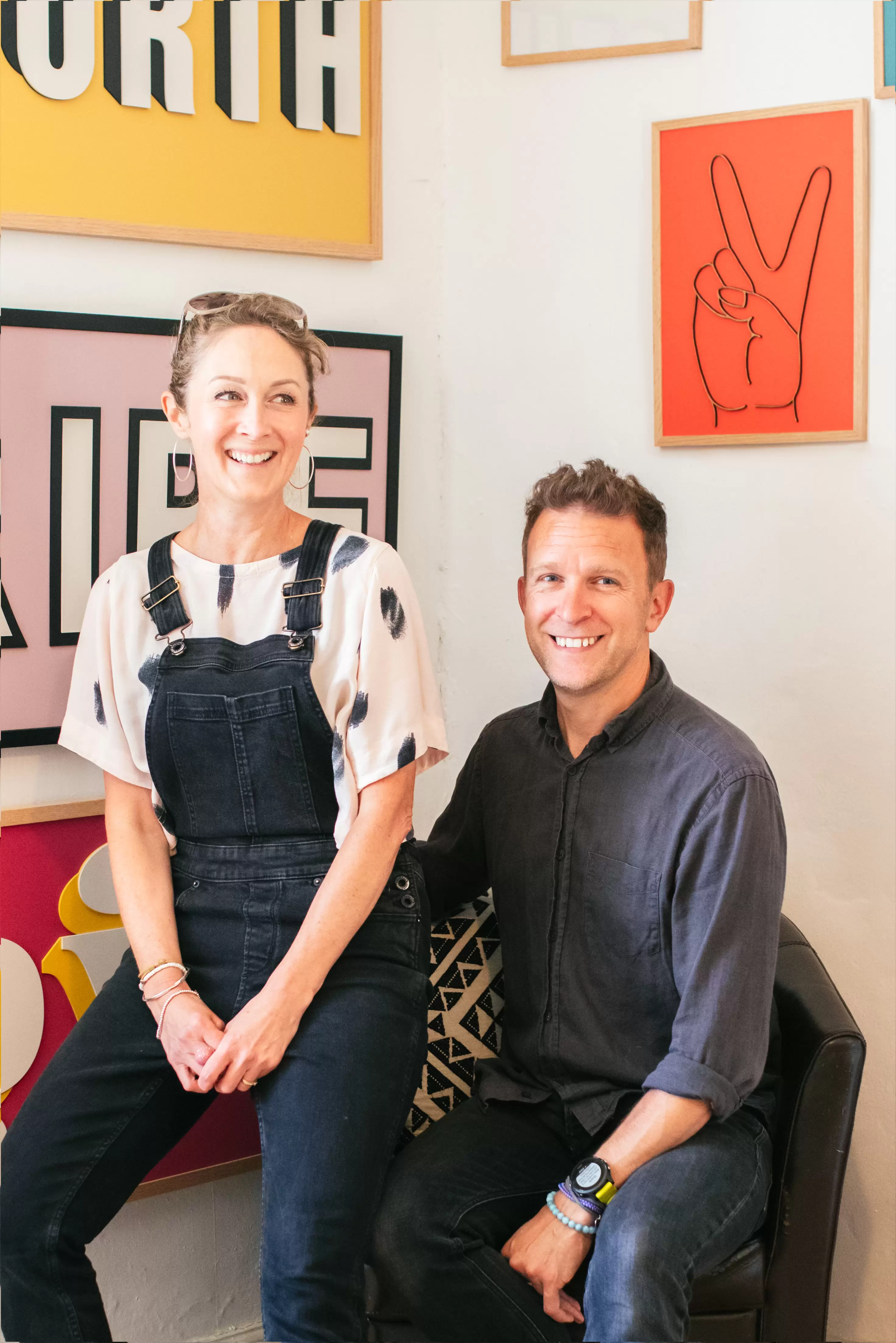 founders, Emma and Andrew Tucker of modo and co sitting in their shop