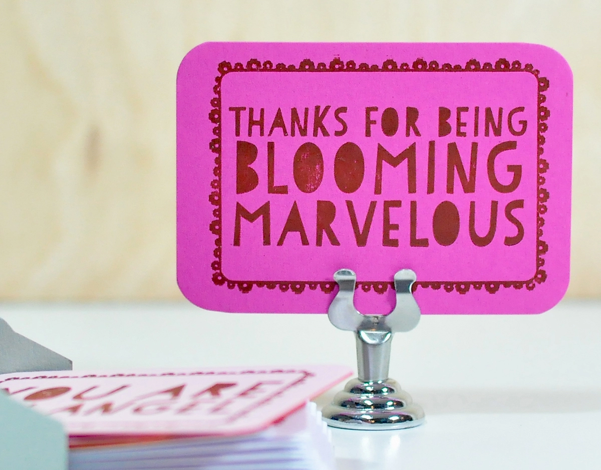 Thanks for being blooming marvelous written in red letters on a pink card 