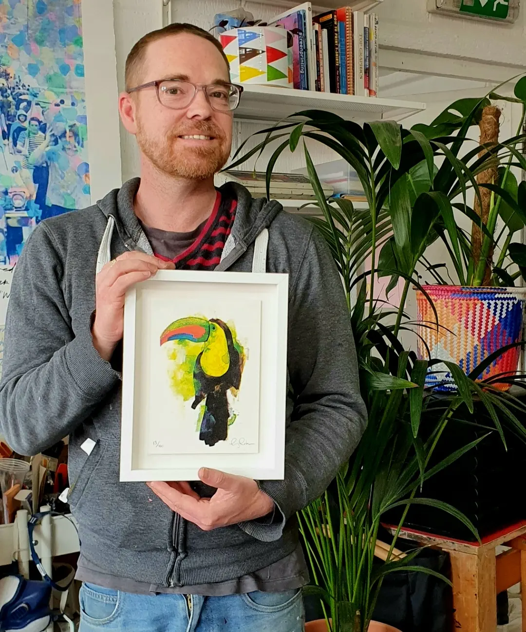 Here's me. Holding one of my handmade glittered screen-prints. Which I hope brings an extra bit of colour to any interior.