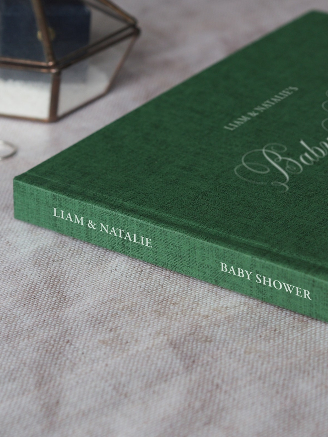 green personalised baby shower guestbook spine